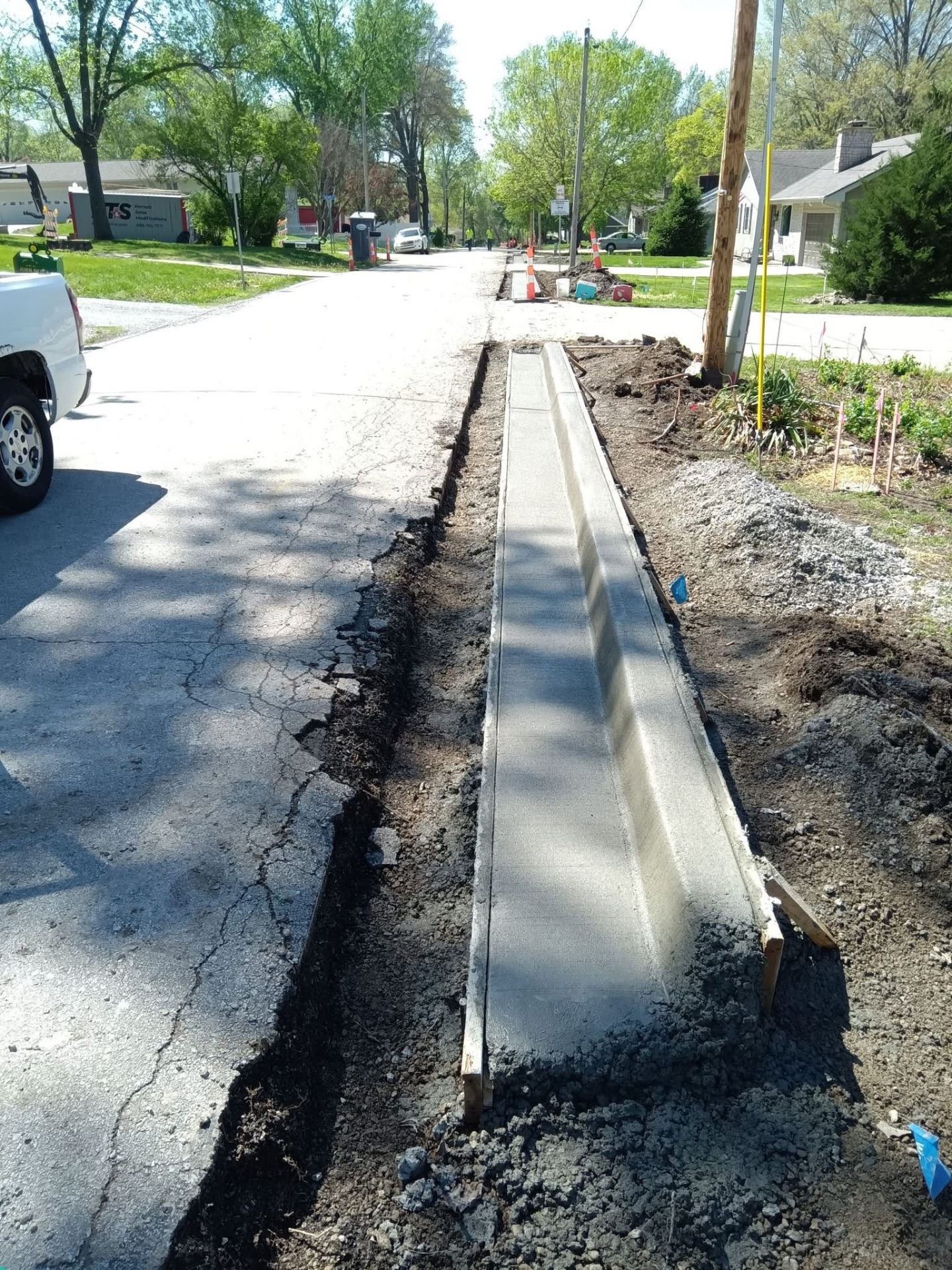 Concrete curb and gutter work in progress in the Kansas City Metro