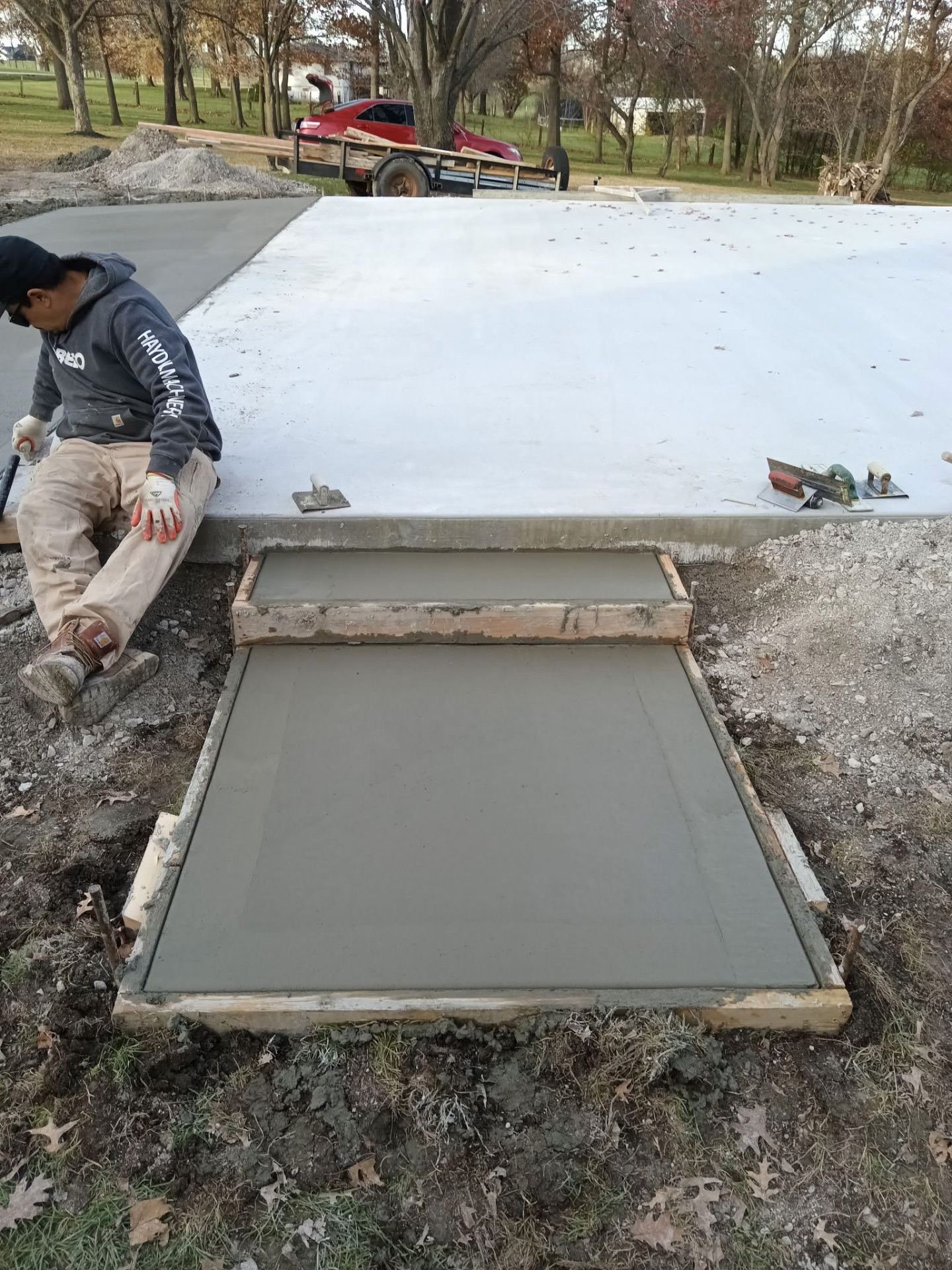 J C Concrete Flatwork crew finishing a fresh concrete pour