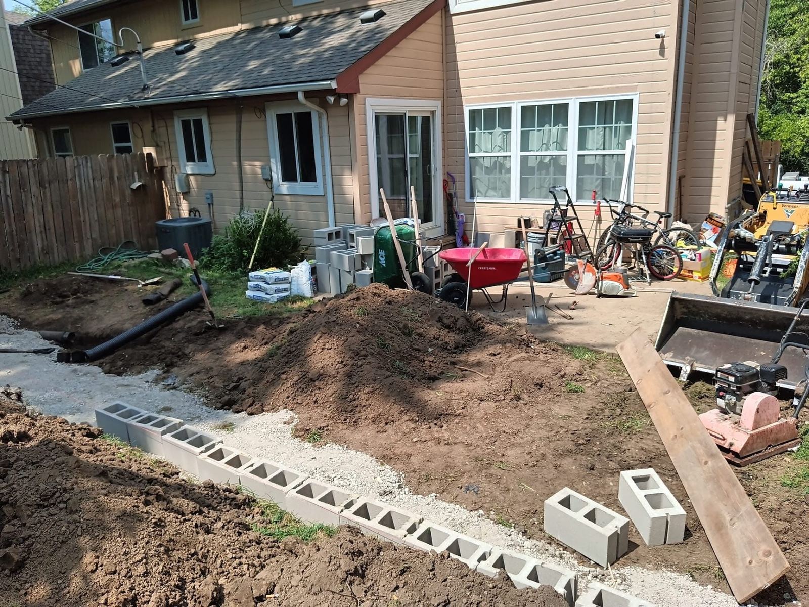 Backyard site prep and grading before a concrete pour
